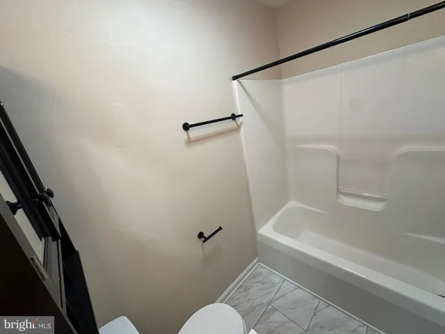 a view of a house with a deck