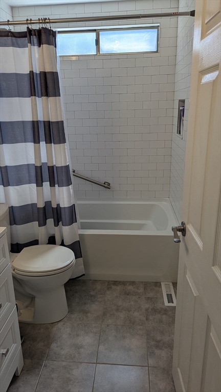 92 Santuit Pond Road Mashpee, MA 02649 - Photo 12 of 23 a bathroom with a toilet and a shower