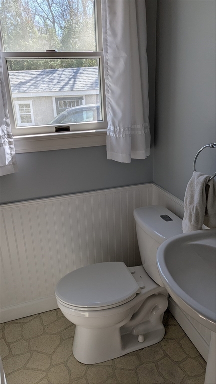 92 Santuit Pond Road Mashpee, MA 02649 - Photo 17 of 23 a bathroom with a toilet and a sink