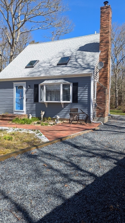 92 Santuit Pond Road Mashpee, MA 02649 - Photo 2 of 23 a view of a house with backyard