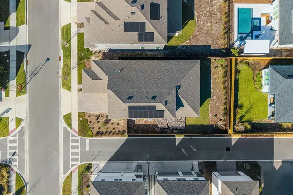 a view of swimming pool with outdoor seating and city view