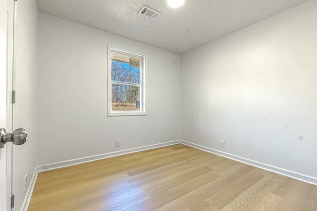 an empty room with a workbench