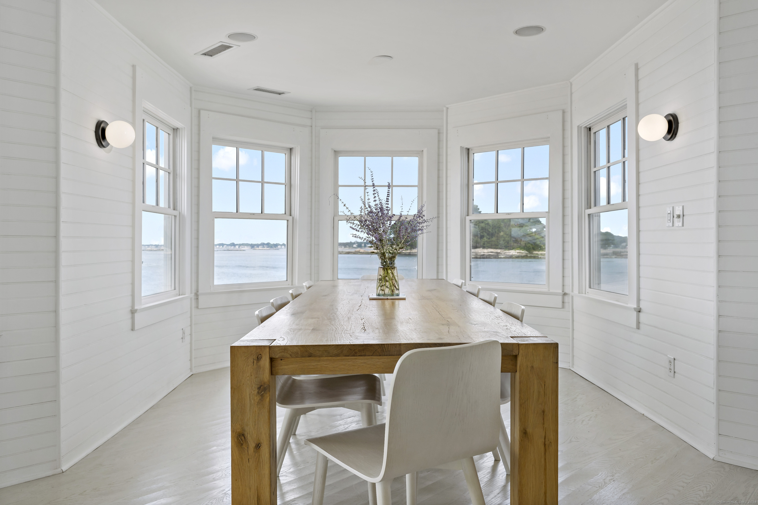 Potato Island Branford, CT 06405 - Photo 11 of 31 a view of a dining room with furniture and wooden floor