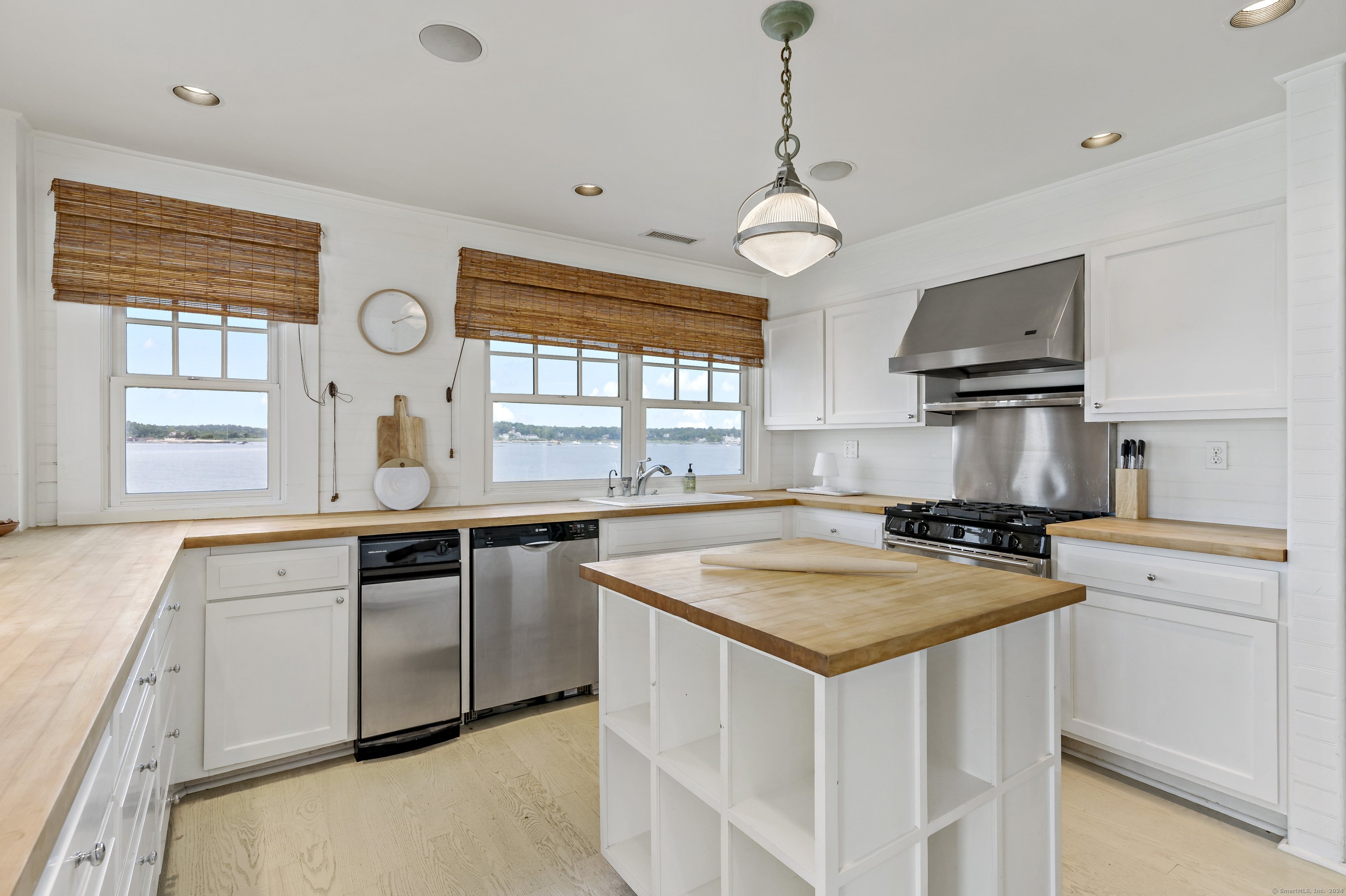 Potato Island Branford, CT 06405 - Photo 12 of 31 a kitchen with stainless steel appliances granite countertop a stove and a sink