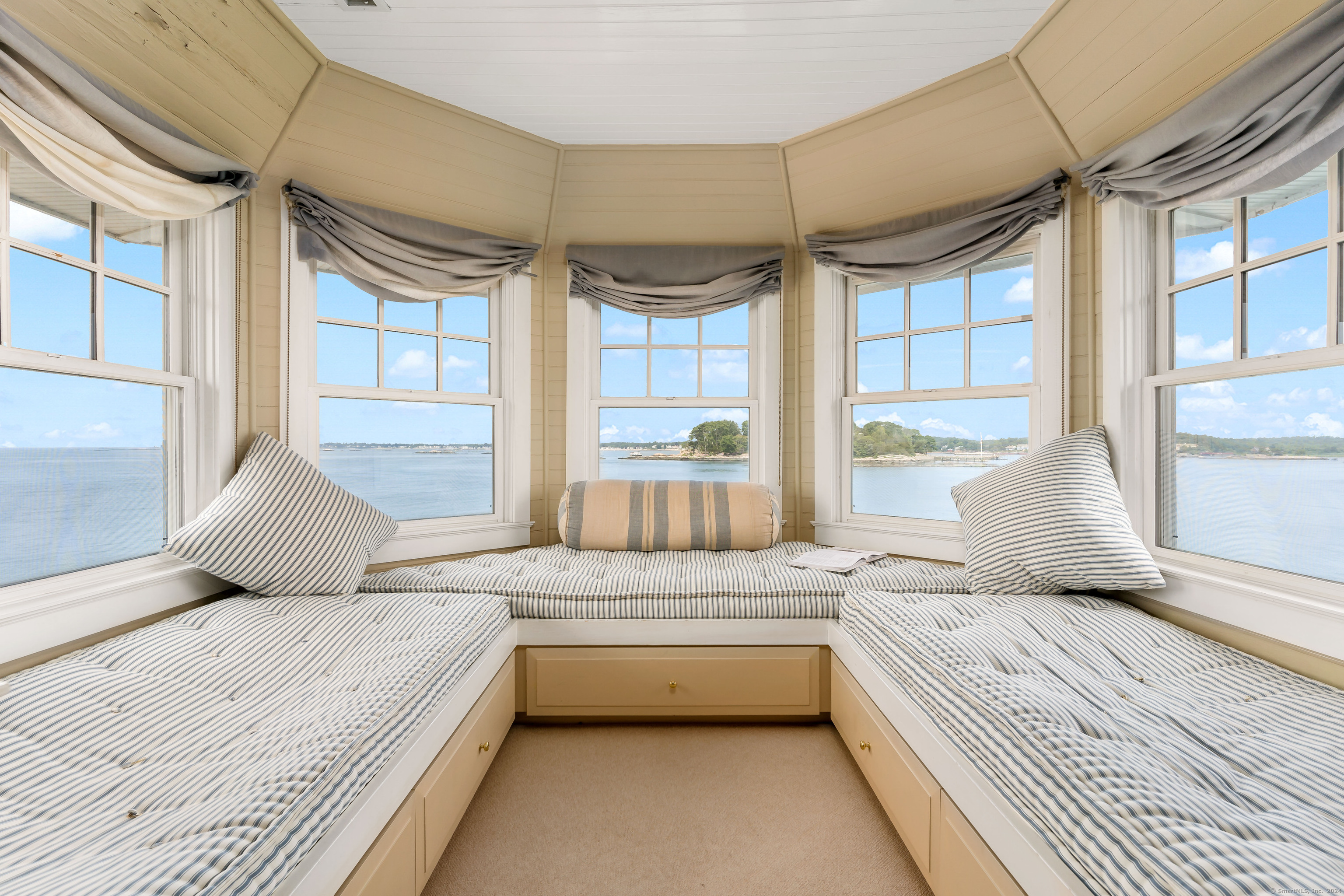 Potato Island Branford, CT 06405 - Photo 23 of 31 a bedroom with a large bed and a window