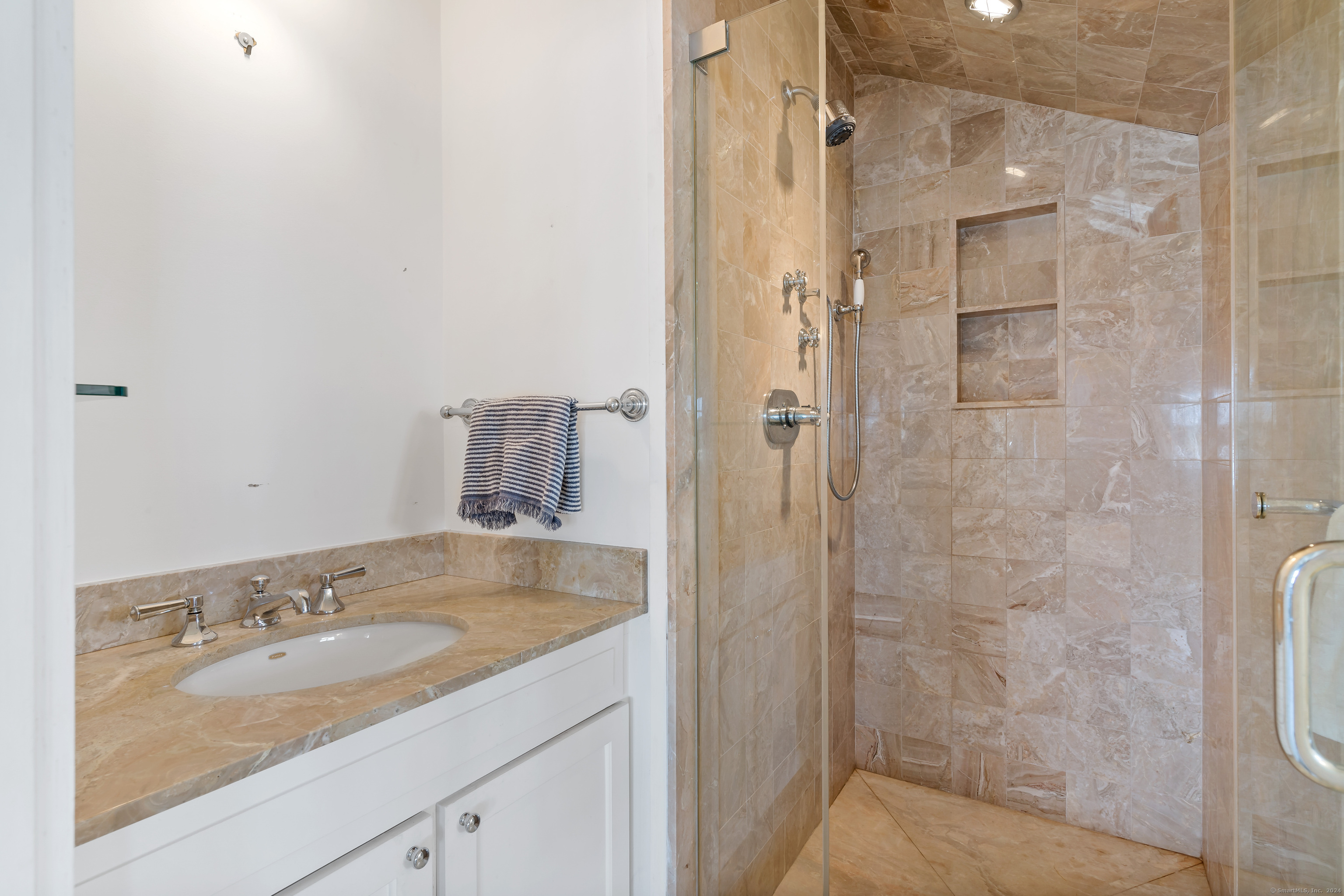 Potato Island Branford, CT 06405 - Photo 26 of 31 a bathroom with a granite countertop sink a shower and a mirror
