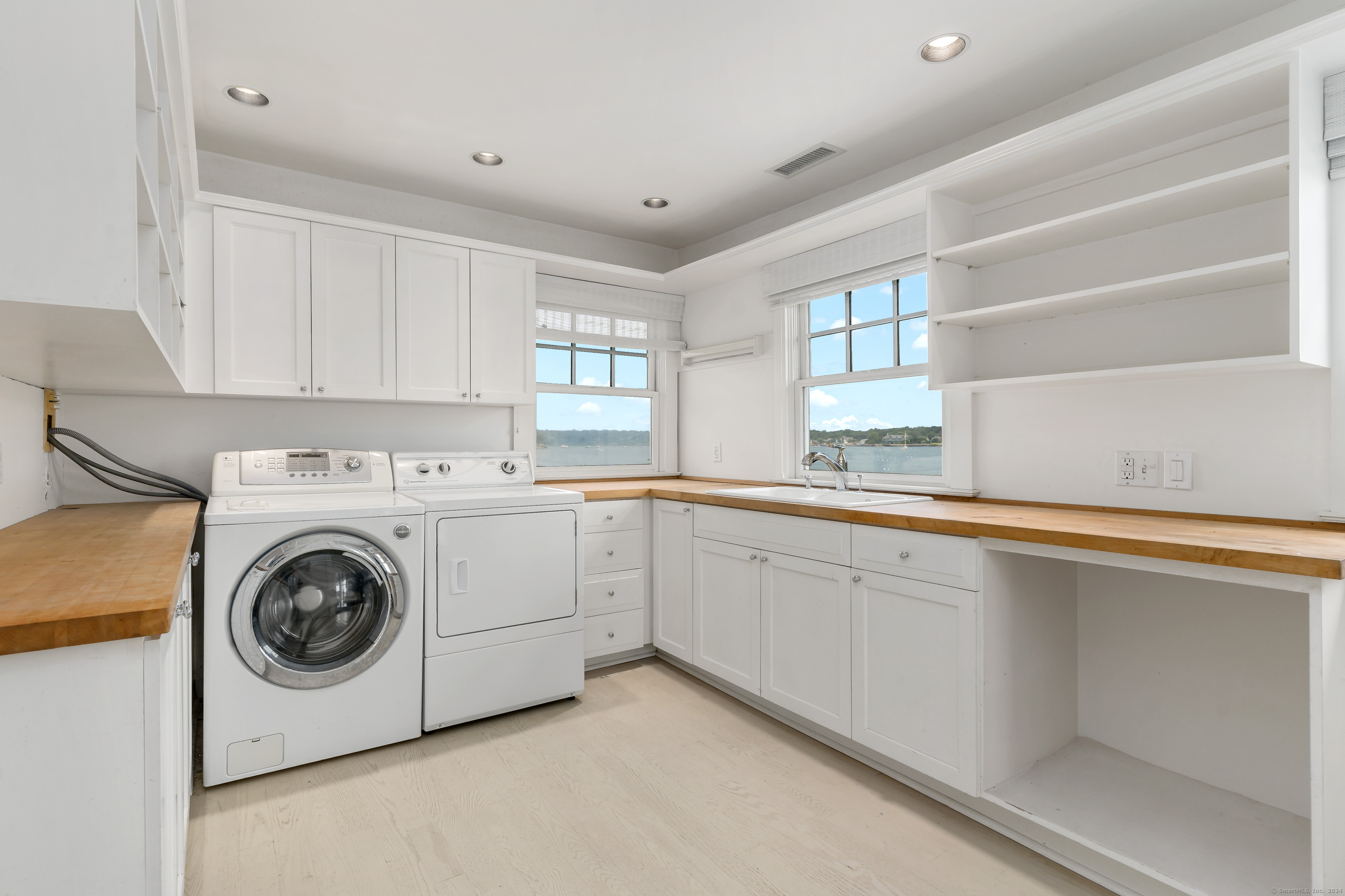 Potato Island Branford, CT 06405 - Photo 27 of 31 a utility room with sink dryer and washer