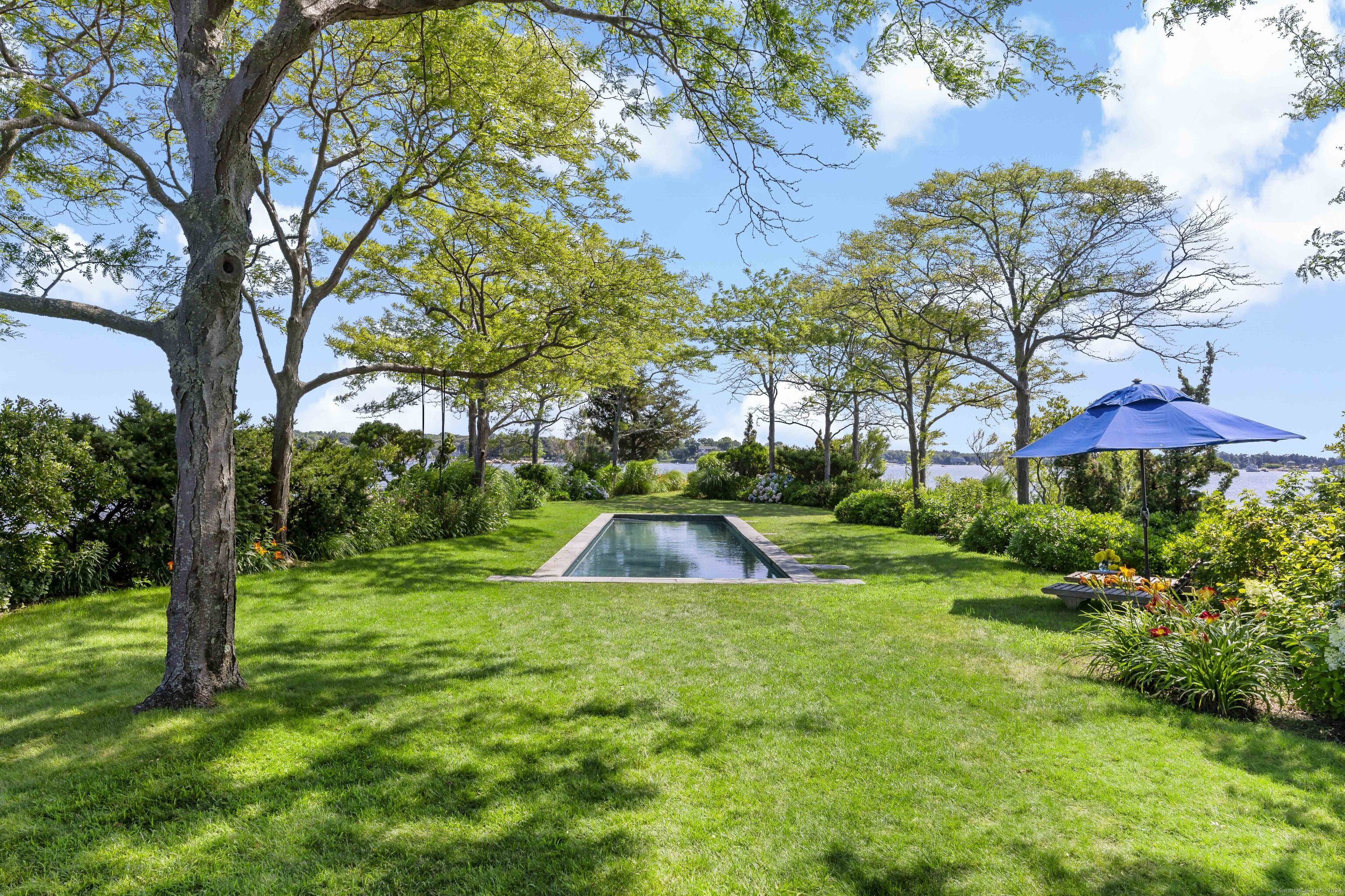 Potato Island Branford, CT 06405 - Photo 31 of 31 a view of a backyard with swimming pool