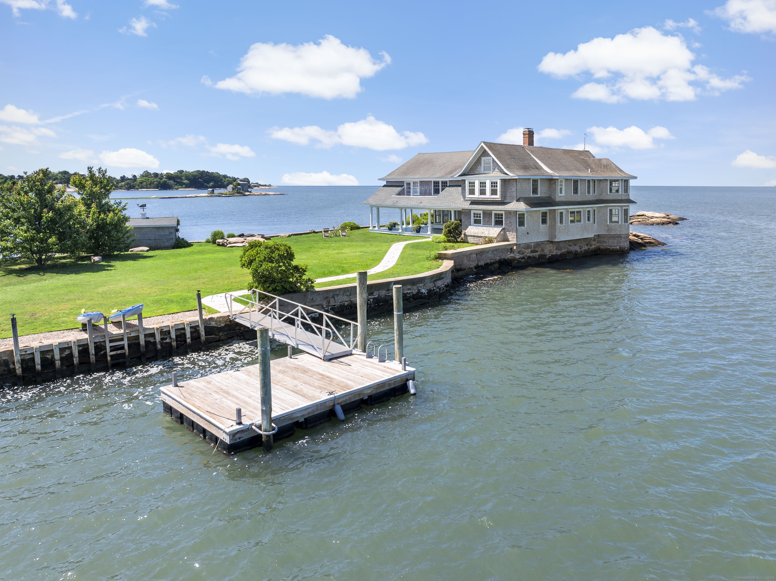 Potato Island Branford, CT 06405 - Photo 6 of 31 an aerial view of a house with swimming pool garden view and a yard