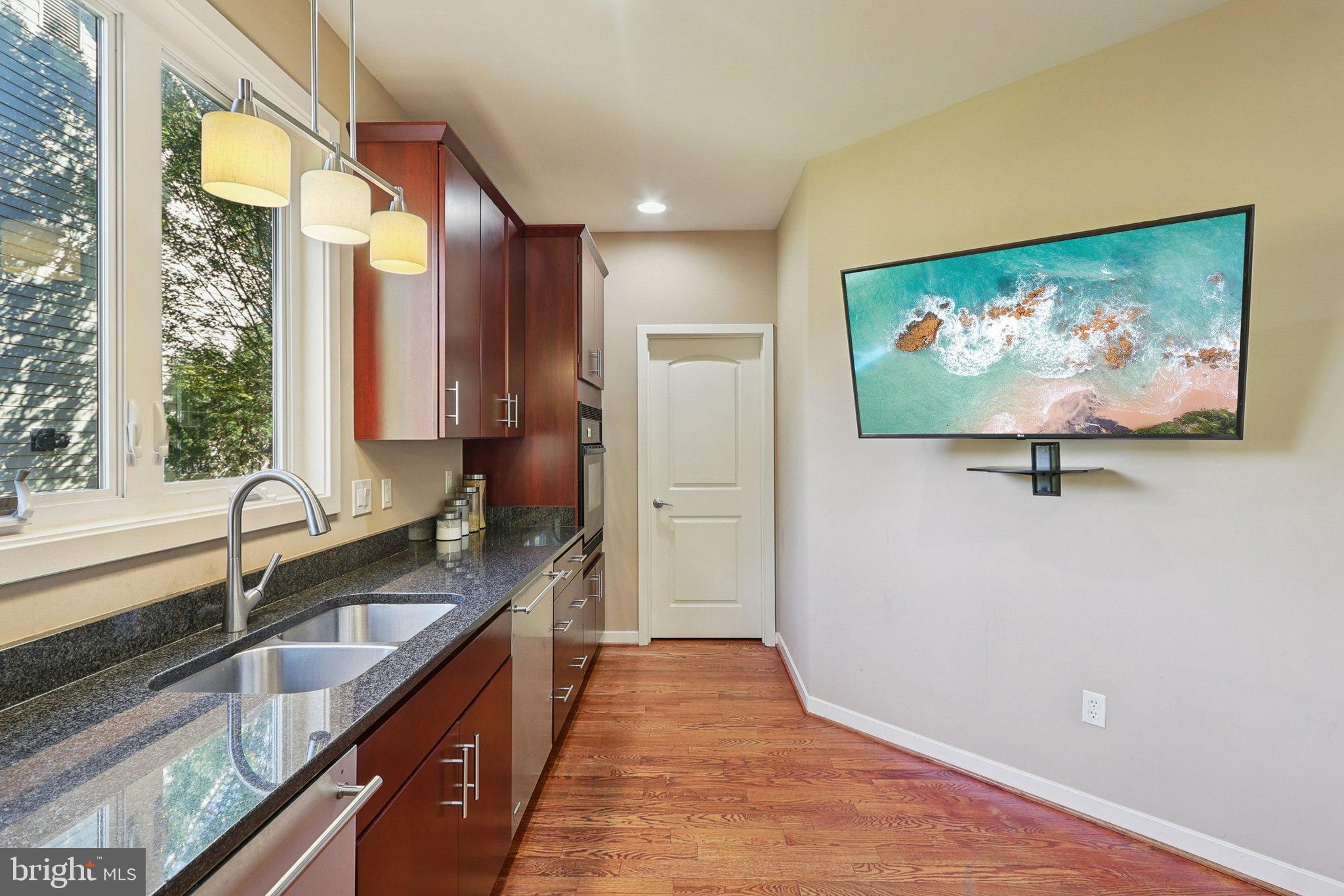 3211 Courtside Road Bowie, MD 20721 - Photo 16 of 108 Modern kitchen with sleek finishes.