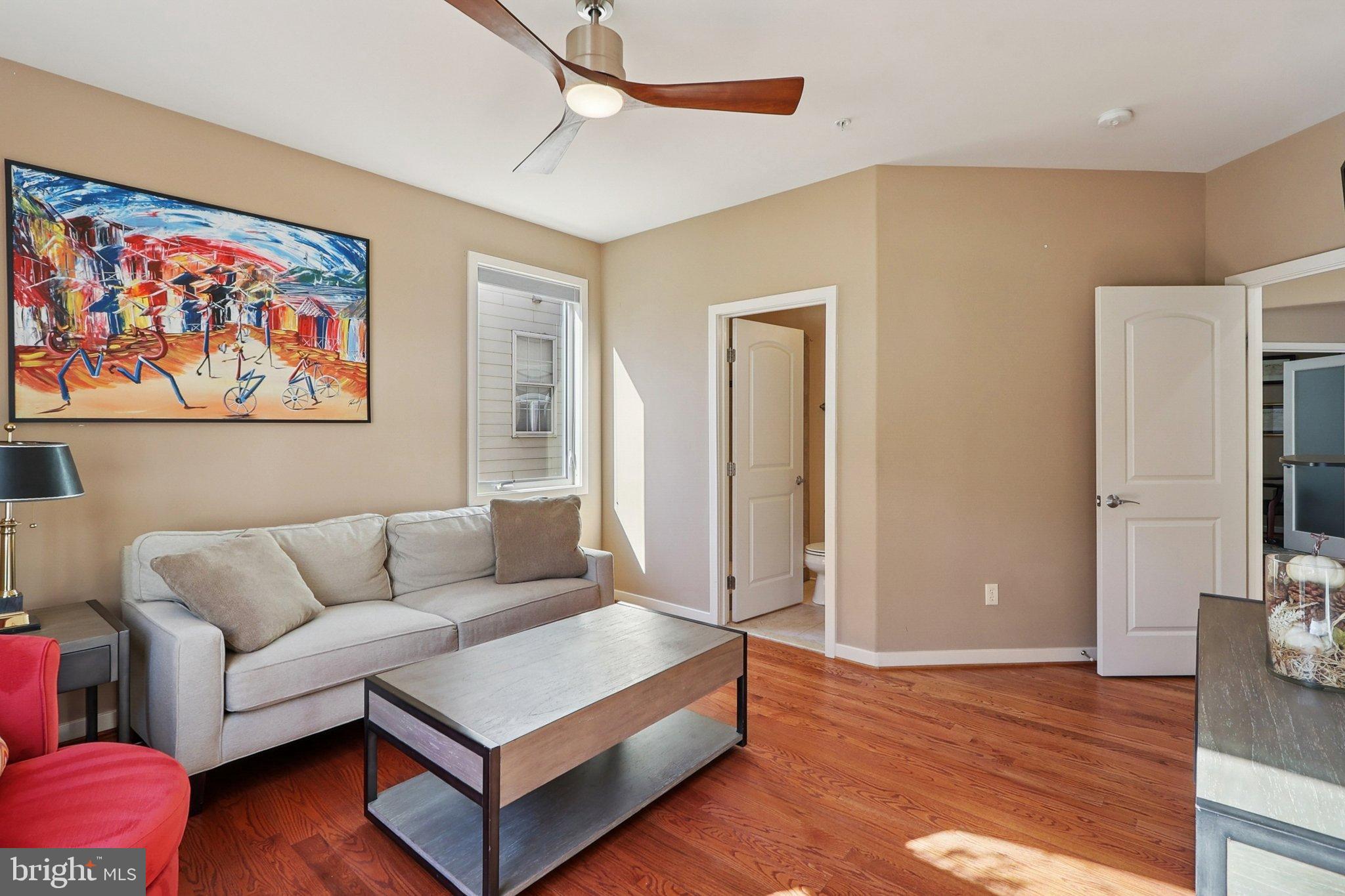 3211 Courtside Road Bowie, MD 20721 - Photo 28 of 108 Bright and inviting living space with art.