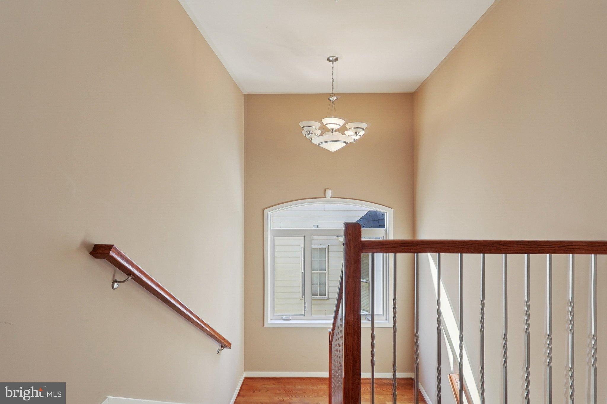 3211 Courtside Road Bowie, MD 20721 - Photo 36 of 108 Elegant staircase with natural light.