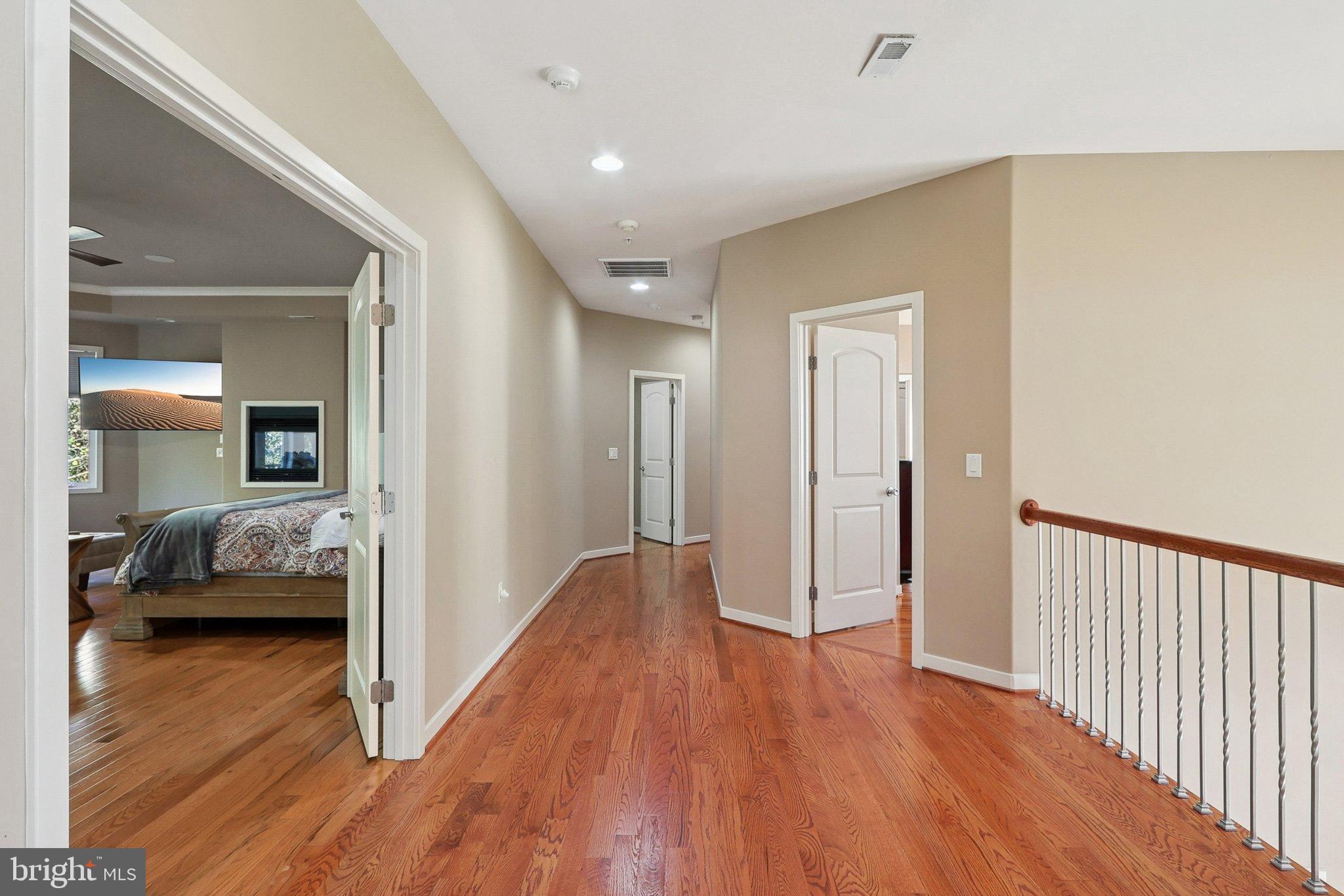 3211 Courtside Road Bowie, MD 20721 - Photo 38 of 108 Inviting hallway with warm wooden floors.