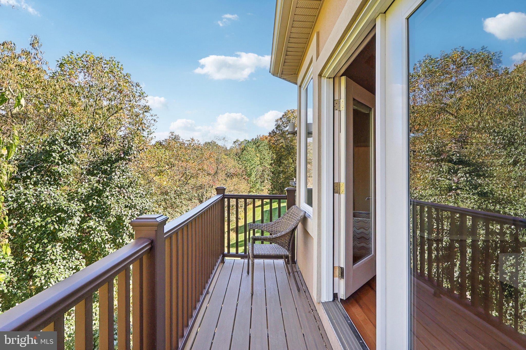 3211 Courtside Road Bowie, MD 20721 - Photo 45 of 108 Deck off primary bedroom with lush forest views.
