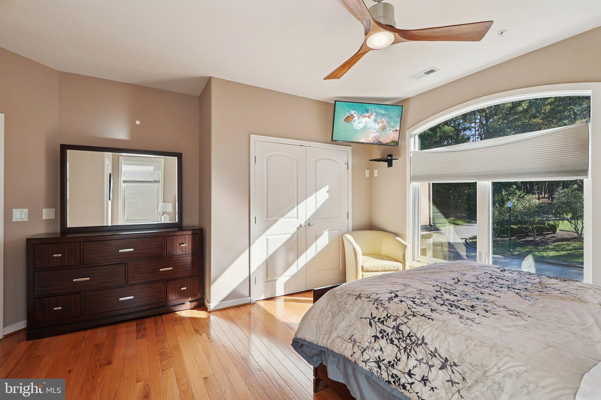 3211 Courtside Road Bowie, MD 20721 - Photo 59 of 108 Sunlit bedroom with modern design elements.