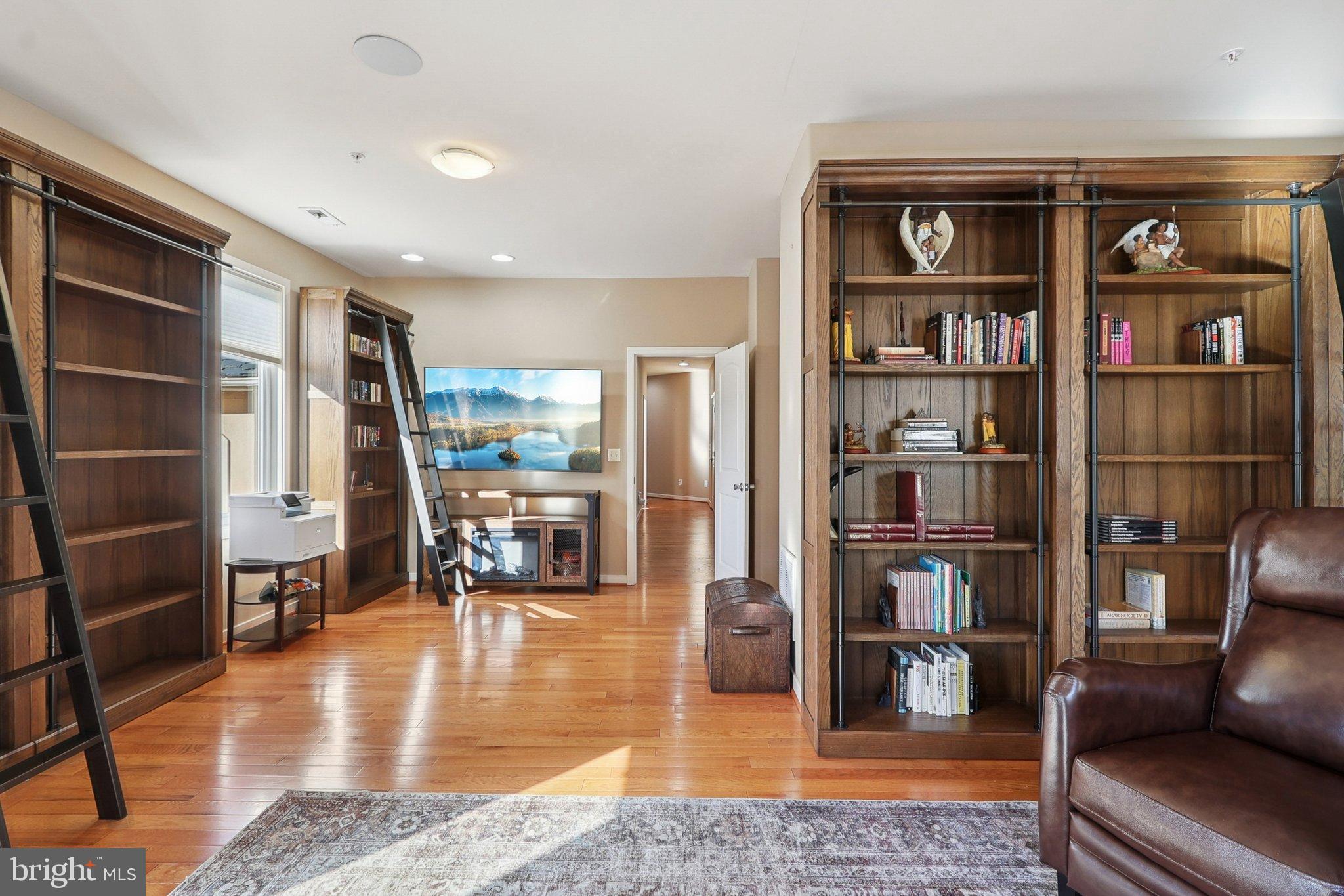3211 Courtside Road Bowie, MD 20721 - Photo 68 of 108 Stylish study with elegant wooden shelves.