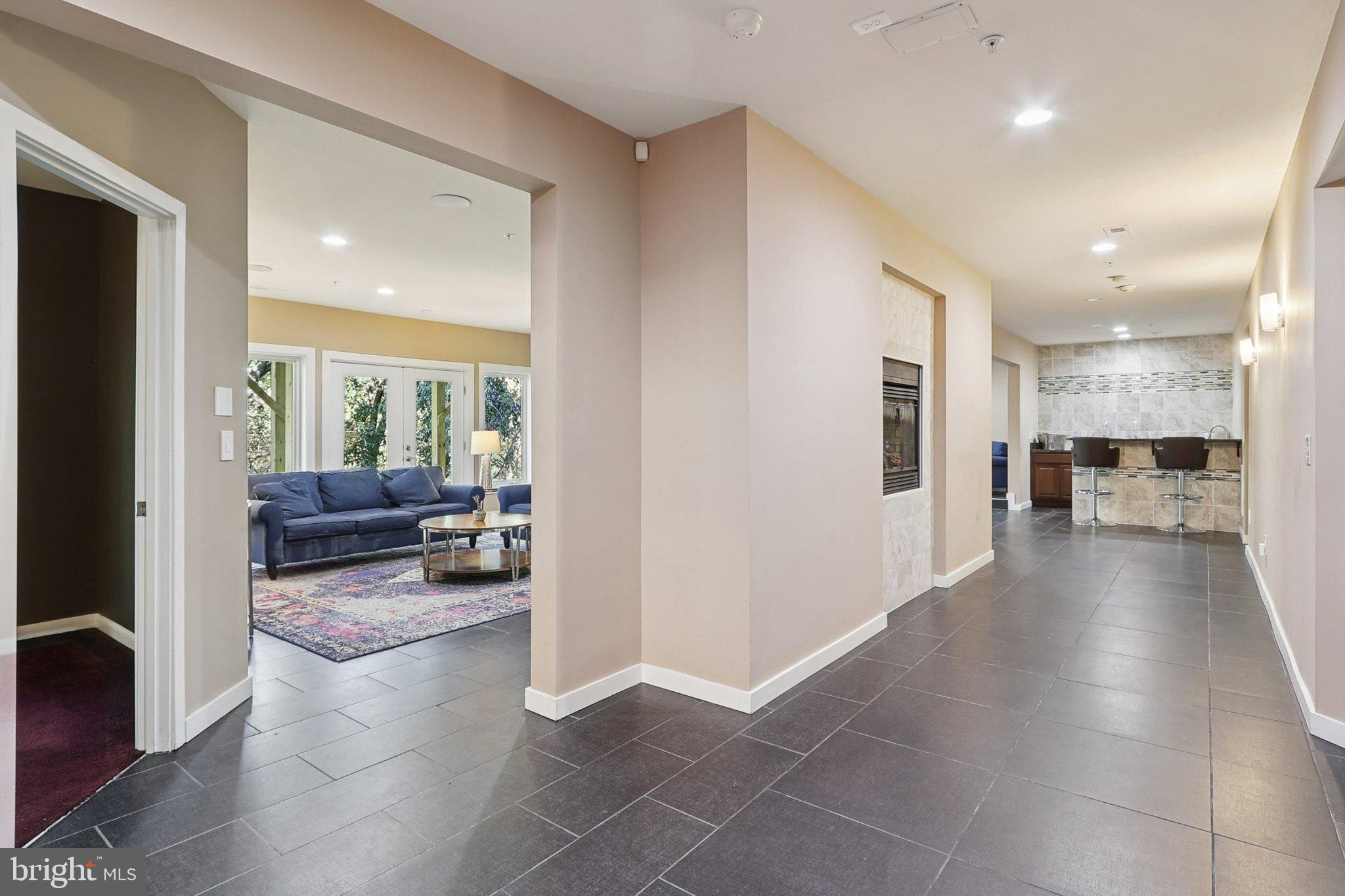 3211 Courtside Road Bowie, MD 20721 - Photo 74 of 108 Spacious hallway leading to inviting living areas.