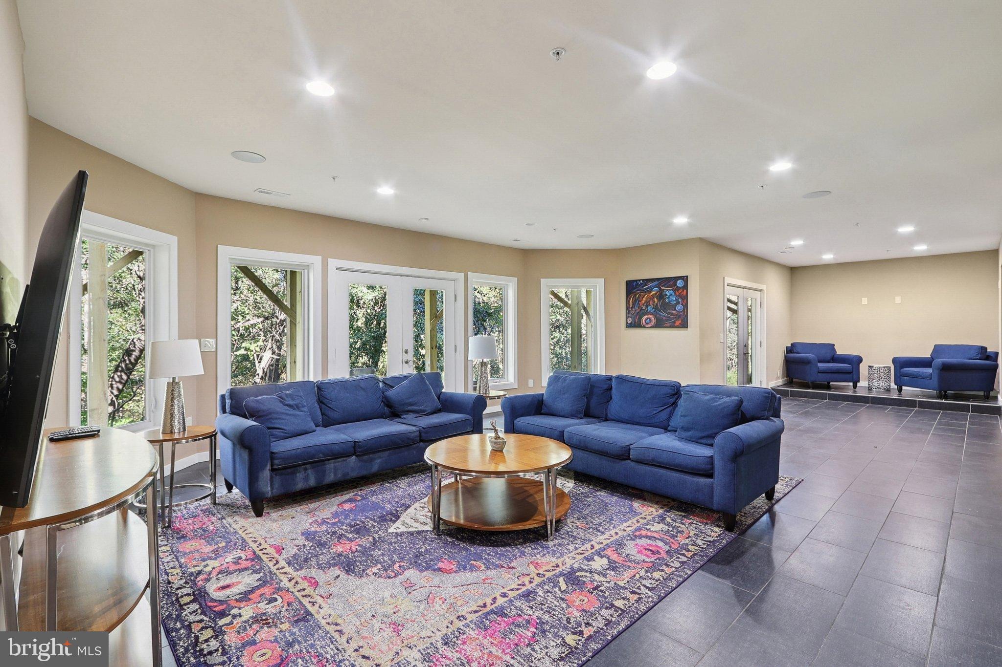 3211 Courtside Road Bowie, MD 20721 - Photo 75 of 108 Spacious lounge with natural light and style.