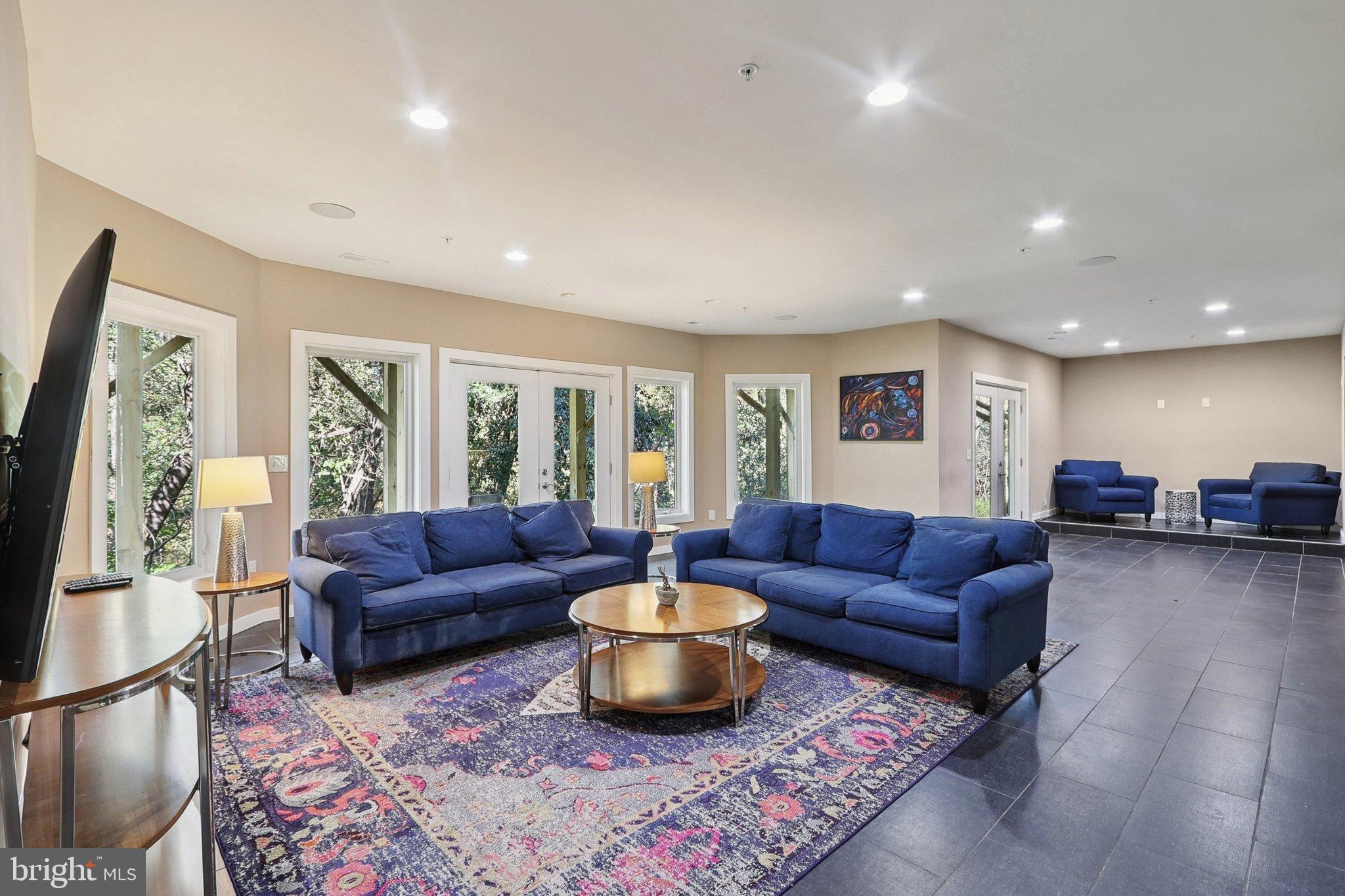 3211 Courtside Road Bowie, MD 20721 - Photo 76 of 108 Spacious lounge with natural light and views.