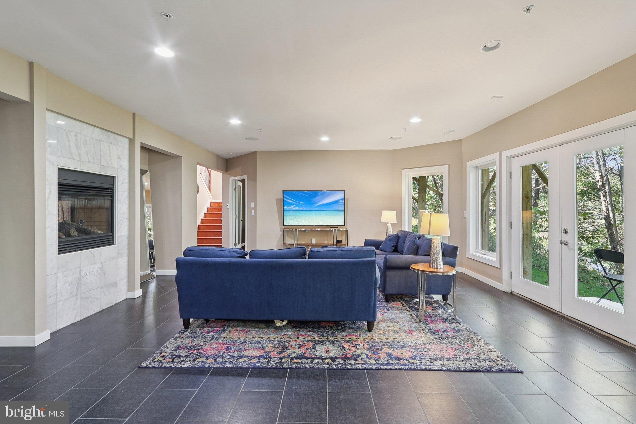 3211 Courtside Road Bowie, MD 20721 - Photo 77 of 108 Lower level rec room with natural light.