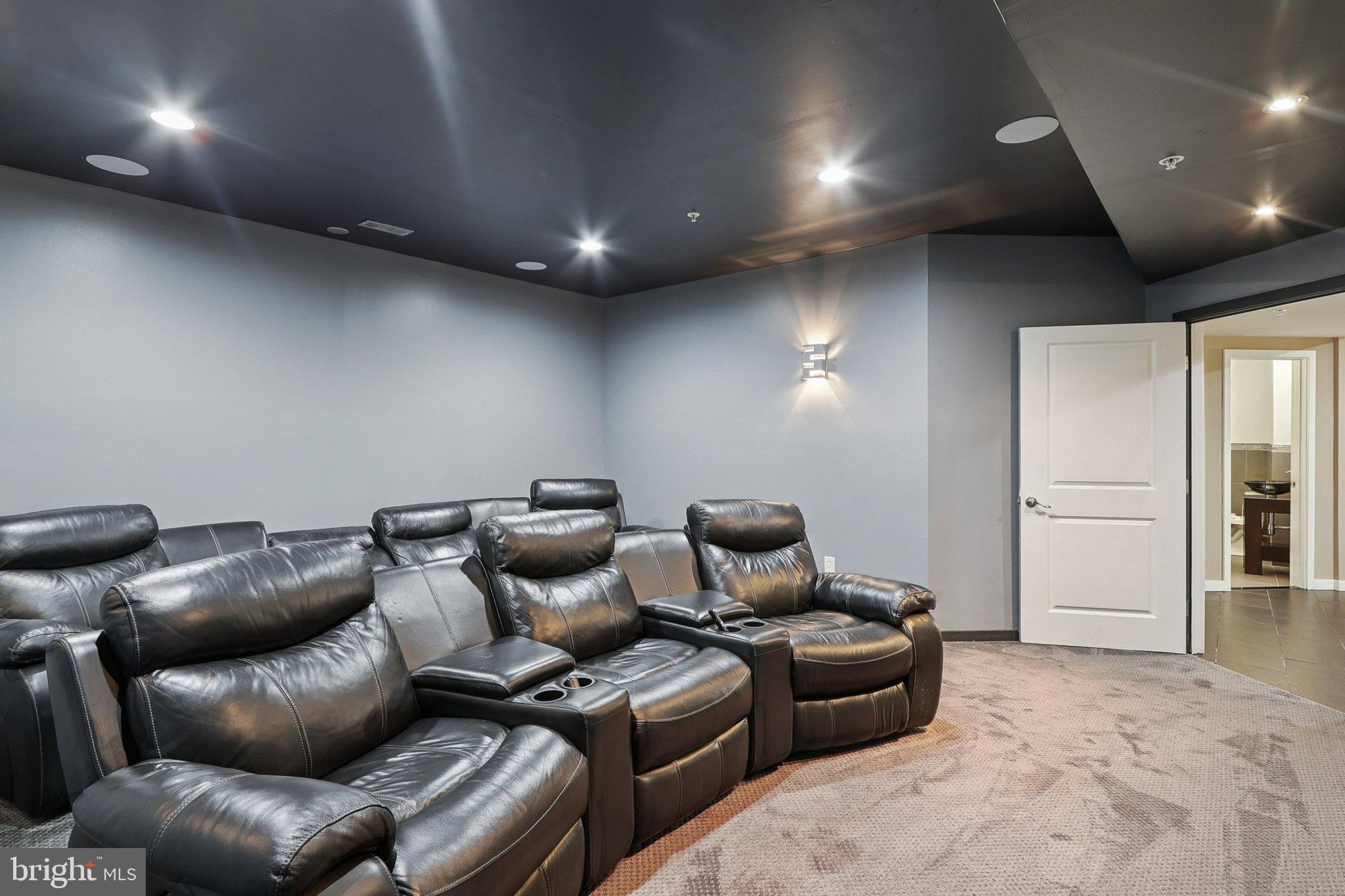3211 Courtside Road Bowie, MD 20721 - Photo 86 of 108 Cozy home theater with plush seating.