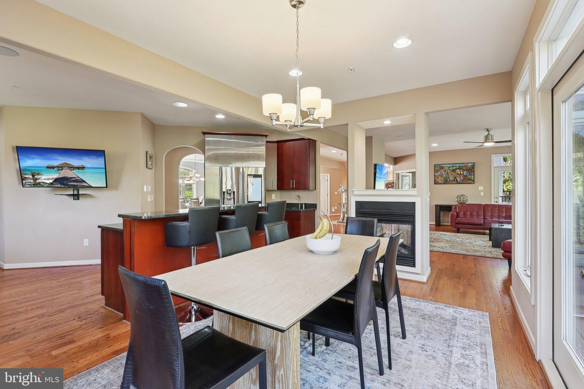 3211 Courtside Road Bowie, MD 20721 - Photo 10 of 108 Modern open-concept dining area with elegance.