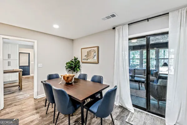 a view of a dining room with furniture