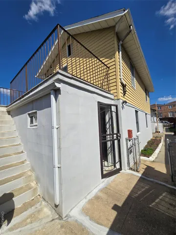 a view of a house with a street
