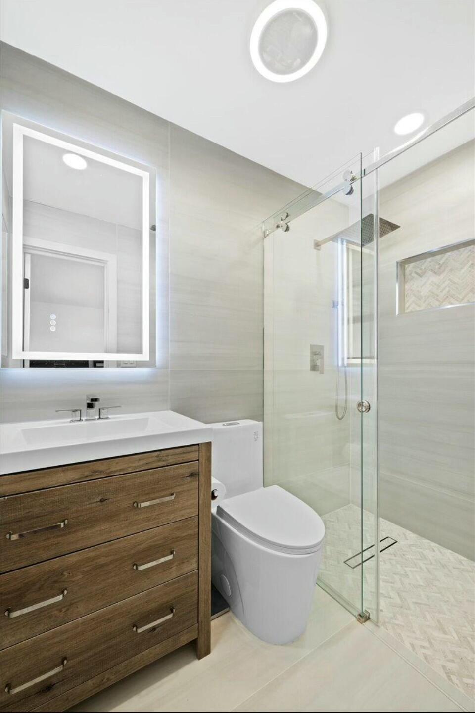 12994 Southeast Papaya Street Hobe Sound, FL 33455 - Photo 18 of 39 Primary Full Bath