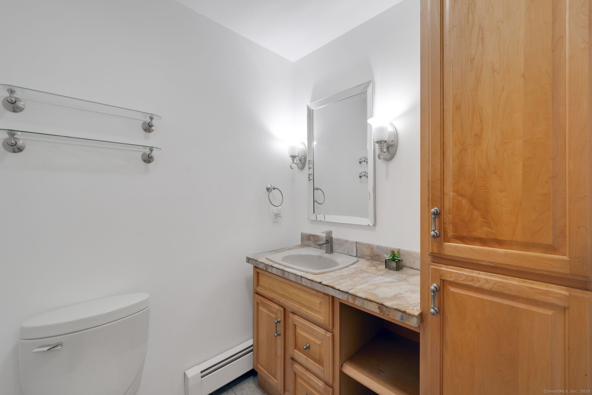 49 South Main Street Marlborough, CT 06447 - Photo 12 of 40 Convenient 1/2 bath on the first floor