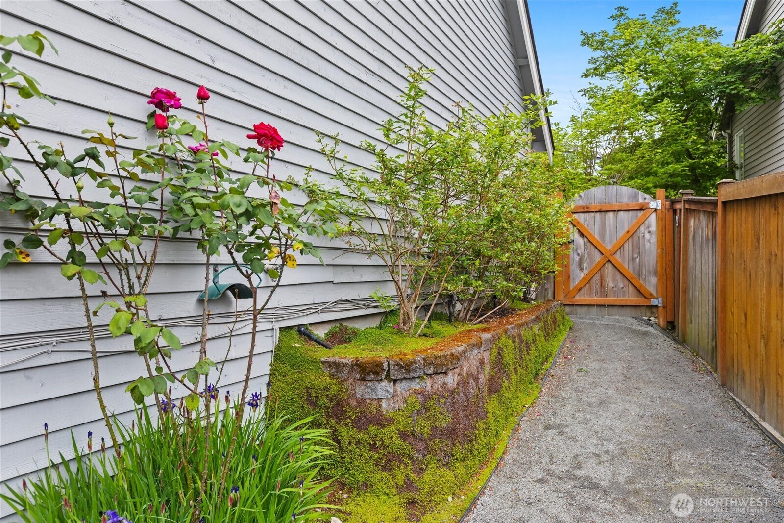 20012 27th Drive Southeast Bothell, WA 98012 - Photo 34 of 39 a view of a house with a flower garden