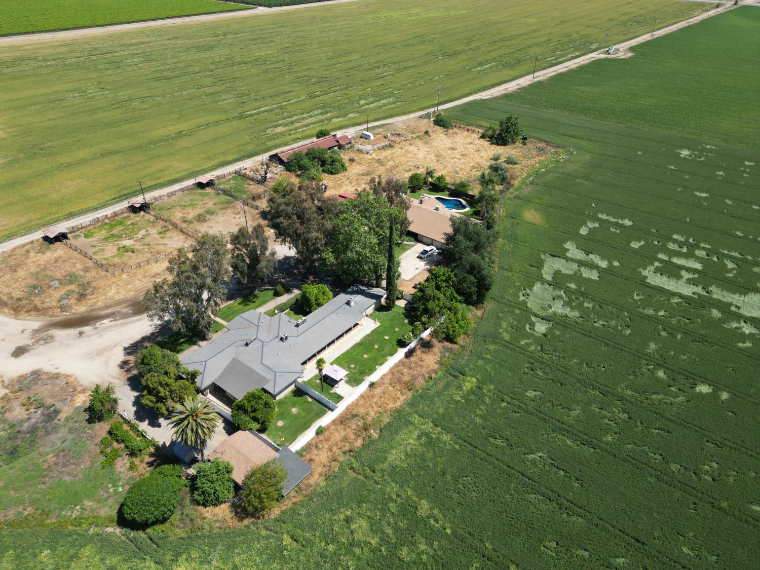 8841 Cross Road Chowchilla, CA 93610 - Photo 8 of 20 a view of an ocean and a houses