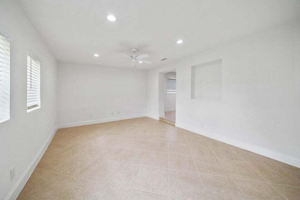 5889 Williamson Road Jupiter, FL 33458 - Photo 10 of 27 a view of an empty room with a window