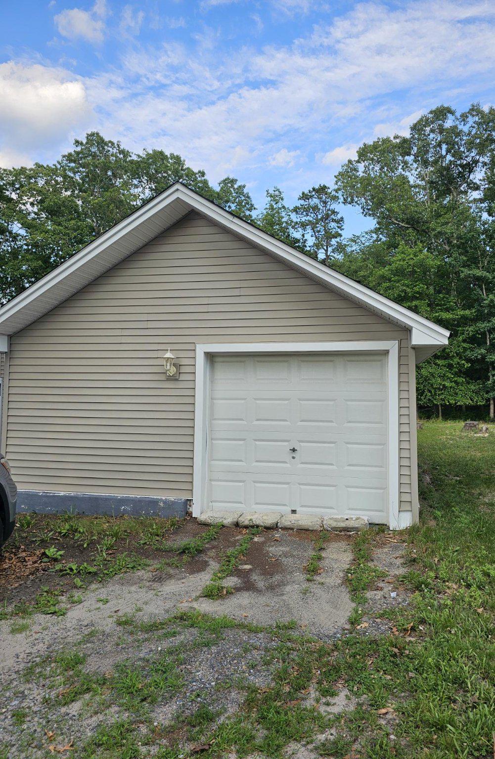 501 Junction Road Browns Mills, NJ 08015 - Photo 24 of 25 Charming detached garage with serene backdrop.