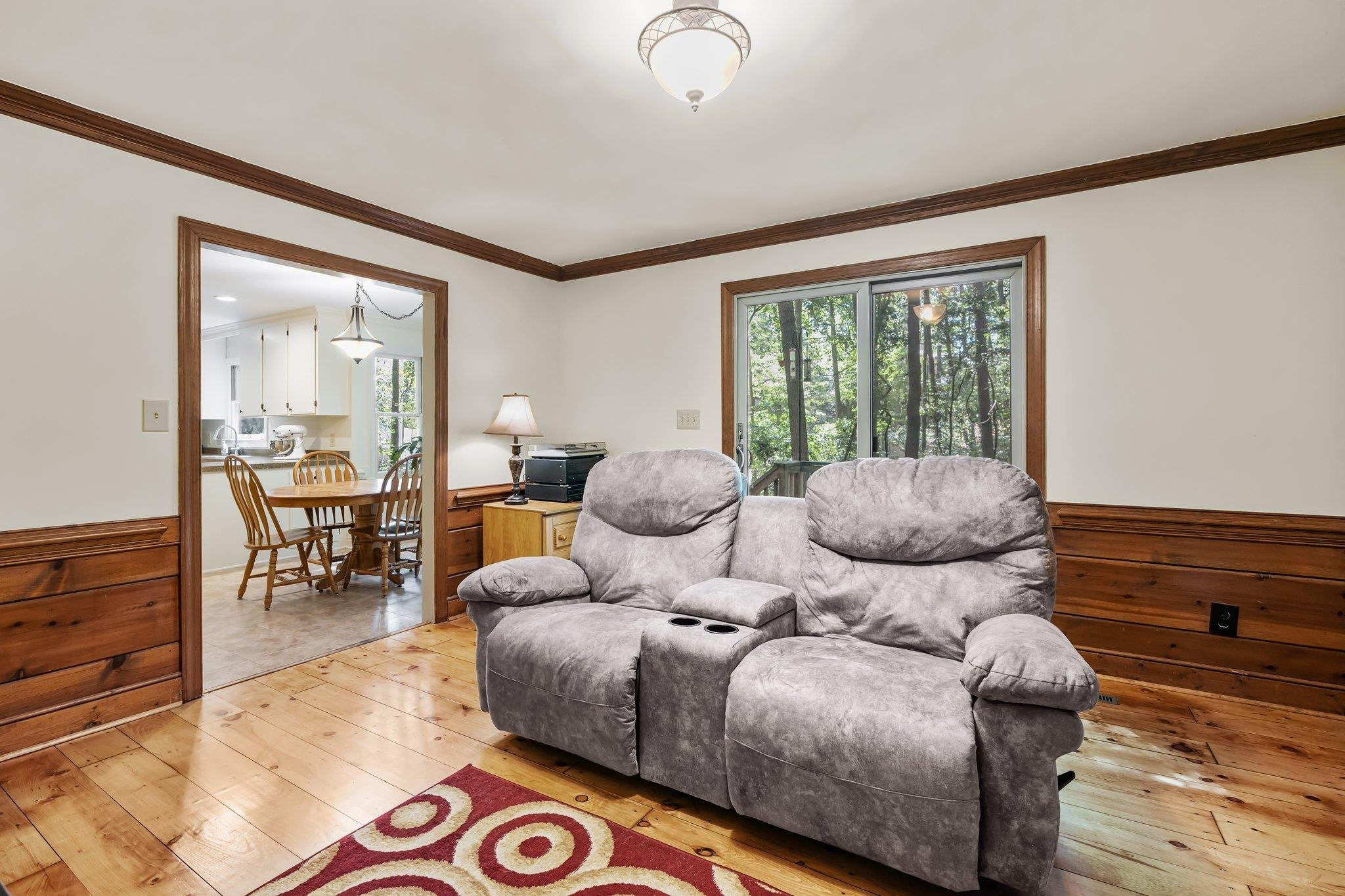 4918 Highgate Drive Durham, NC 27713 - Photo 13 of 44 a living room with furniture and a large window