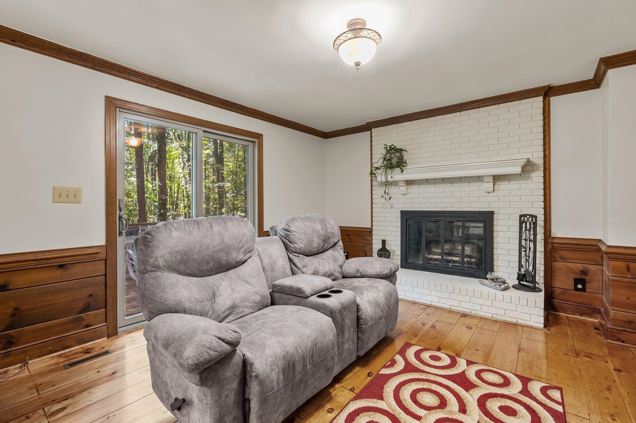 4918 Highgate Drive Durham, NC 27713 - Photo 15 of 44 a living room with furniture and a fireplace