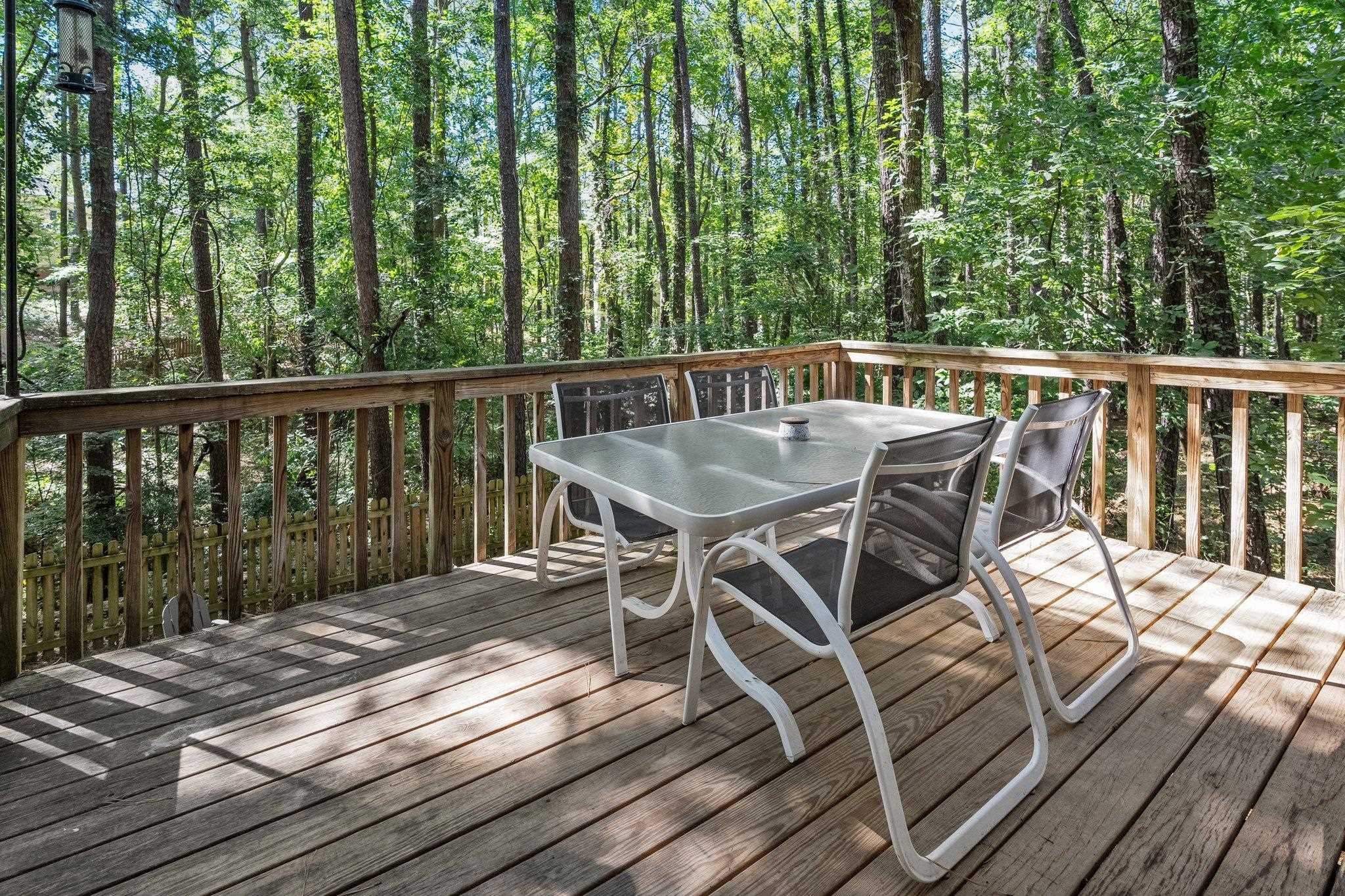 4918 Highgate Drive Durham, NC 27713 - Photo 19 of 44 a view of a balcony with wooden floor