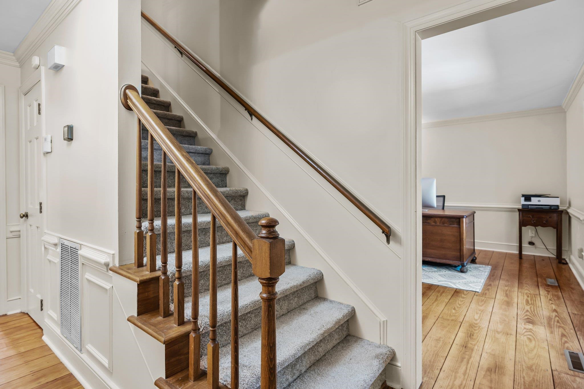 4918 Highgate Drive Durham, NC 27713 - Photo 24 of 44 a view of entryway and hall with wooden floor