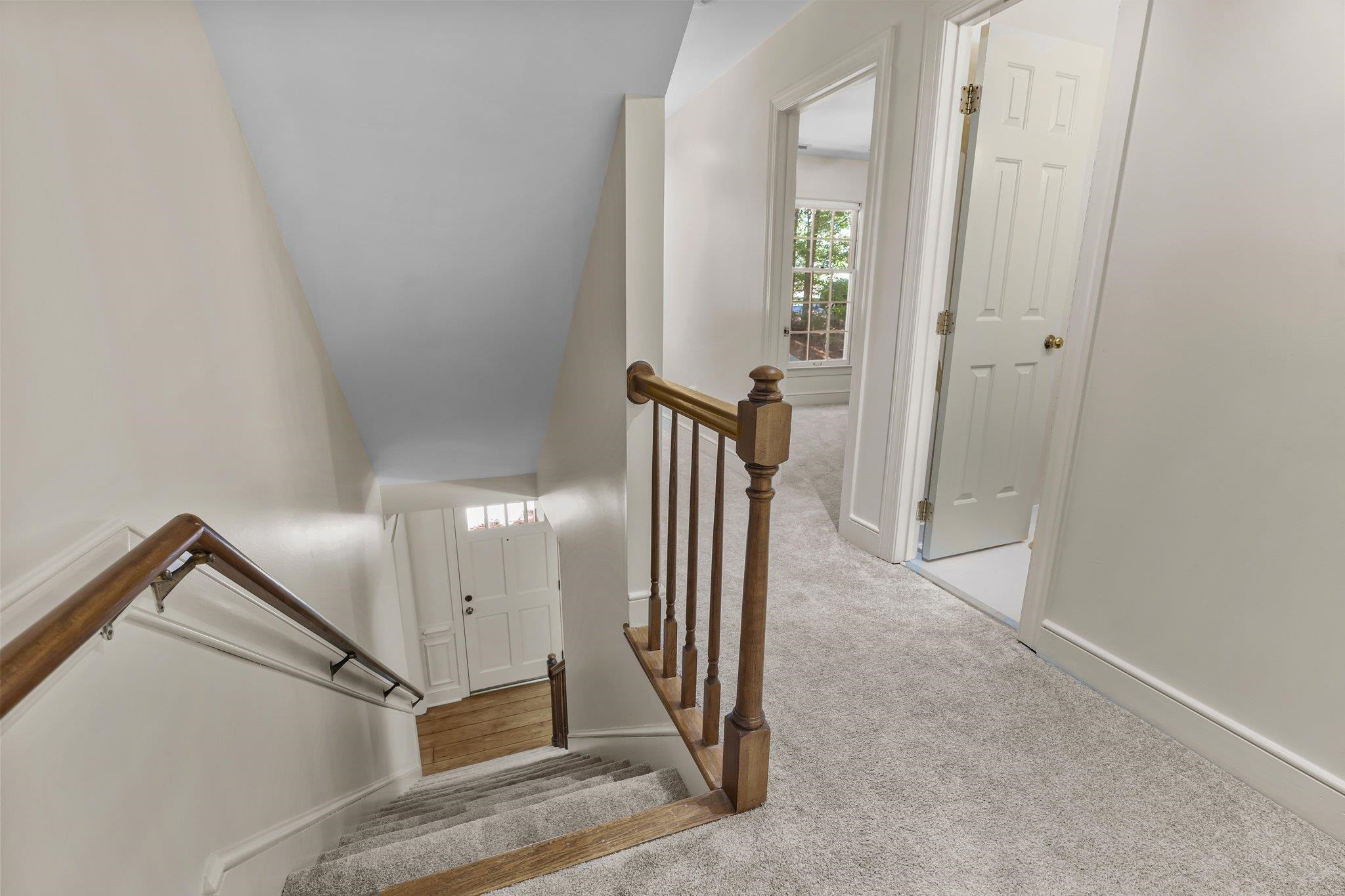 4918 Highgate Drive Durham, NC 27713 - Photo 25 of 44 a view of a hallway with staircase