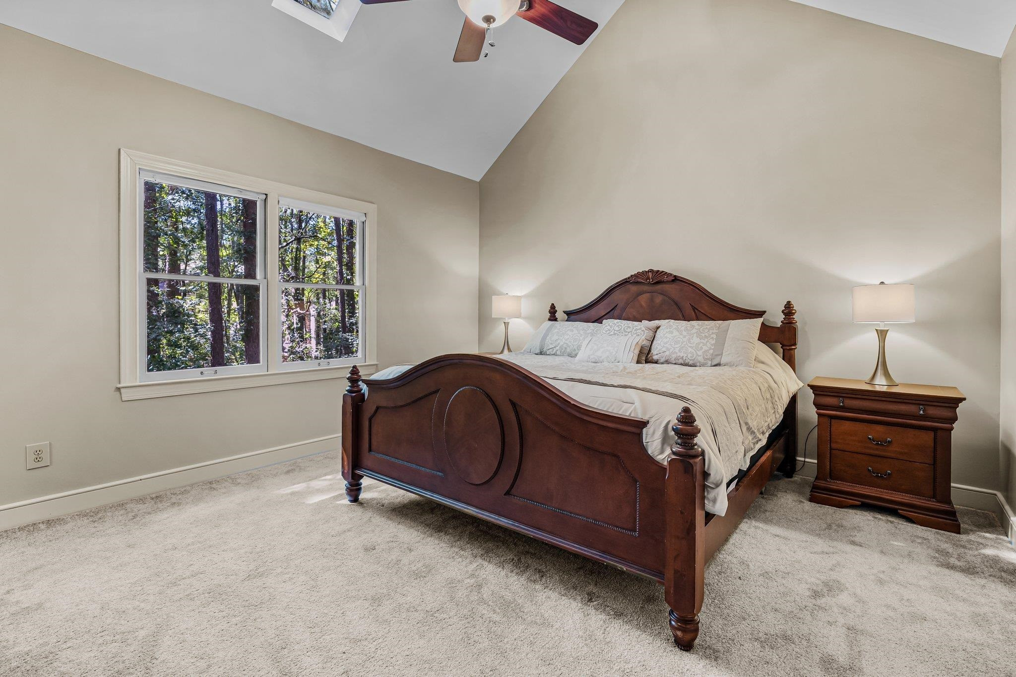 4918 Highgate Drive Durham, NC 27713 - Photo 26 of 44 a bedroom with a bed and a window