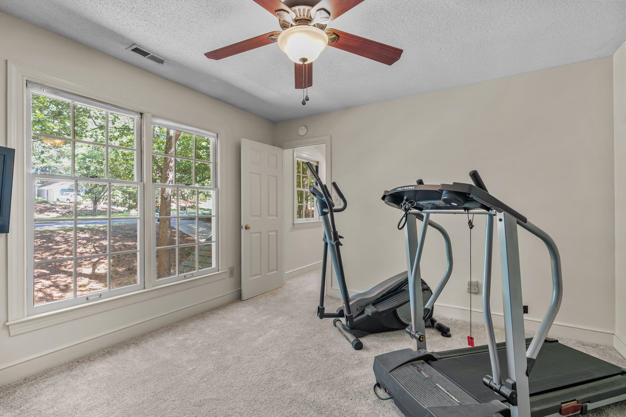 4918 Highgate Drive Durham, NC 27713 - Photo 39 of 44 a view of a room with gym equipment