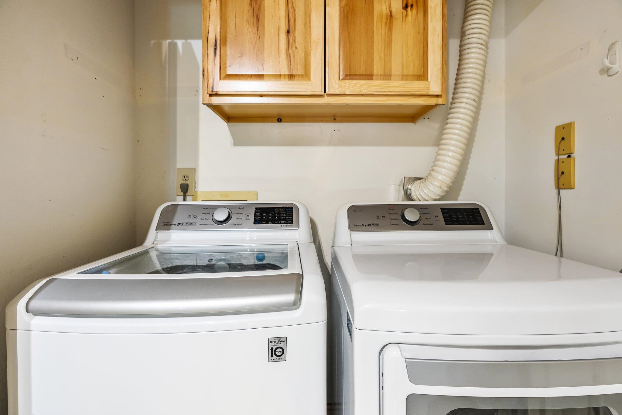 4918 Highgate Drive Durham, NC 27713 - Photo 40 of 44 a close view of laundry room with a washer and dryer