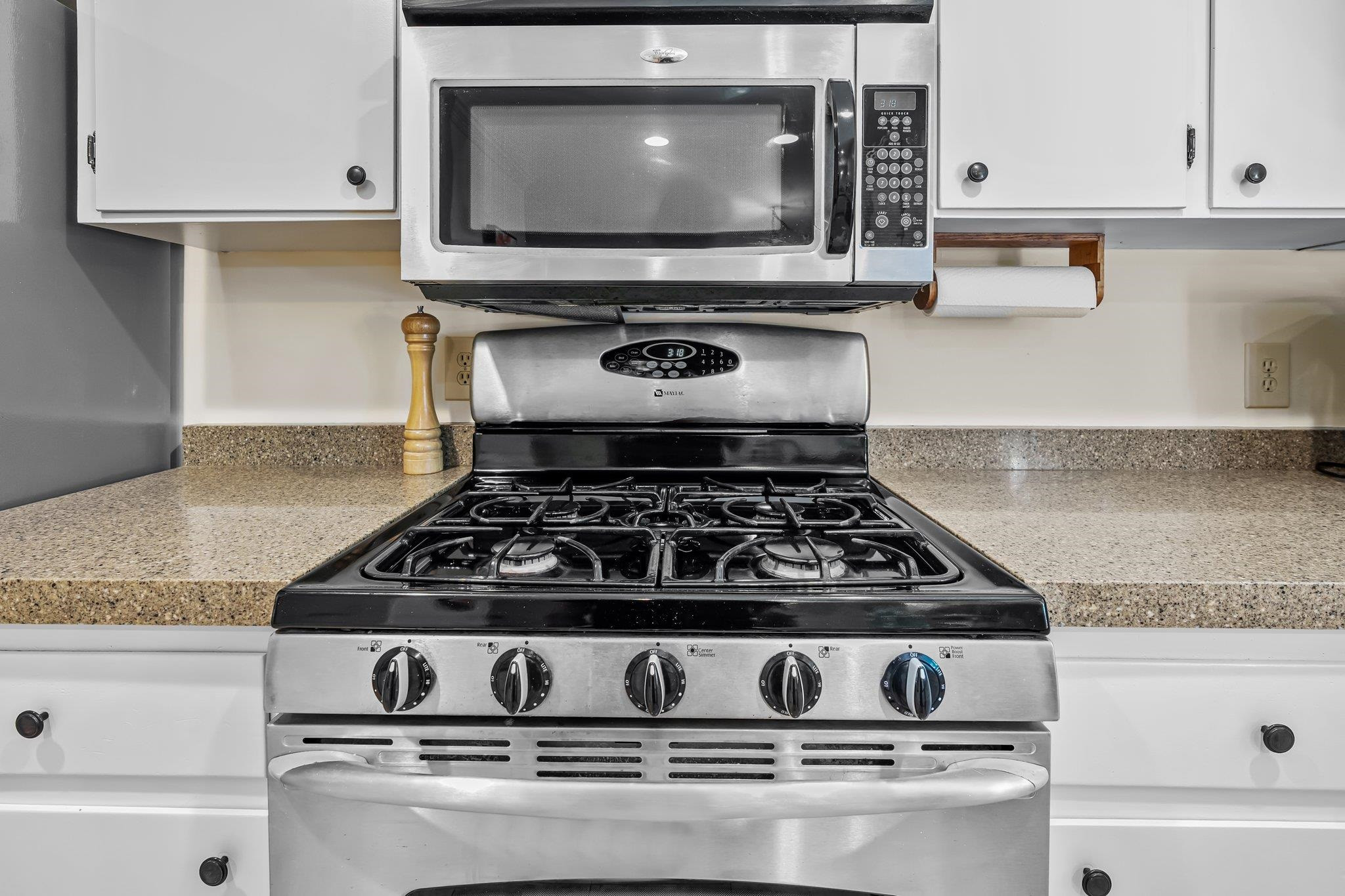 4918 Highgate Drive Durham, NC 27713 - Photo 9 of 44 a stove top oven sitting inside of a kitchen