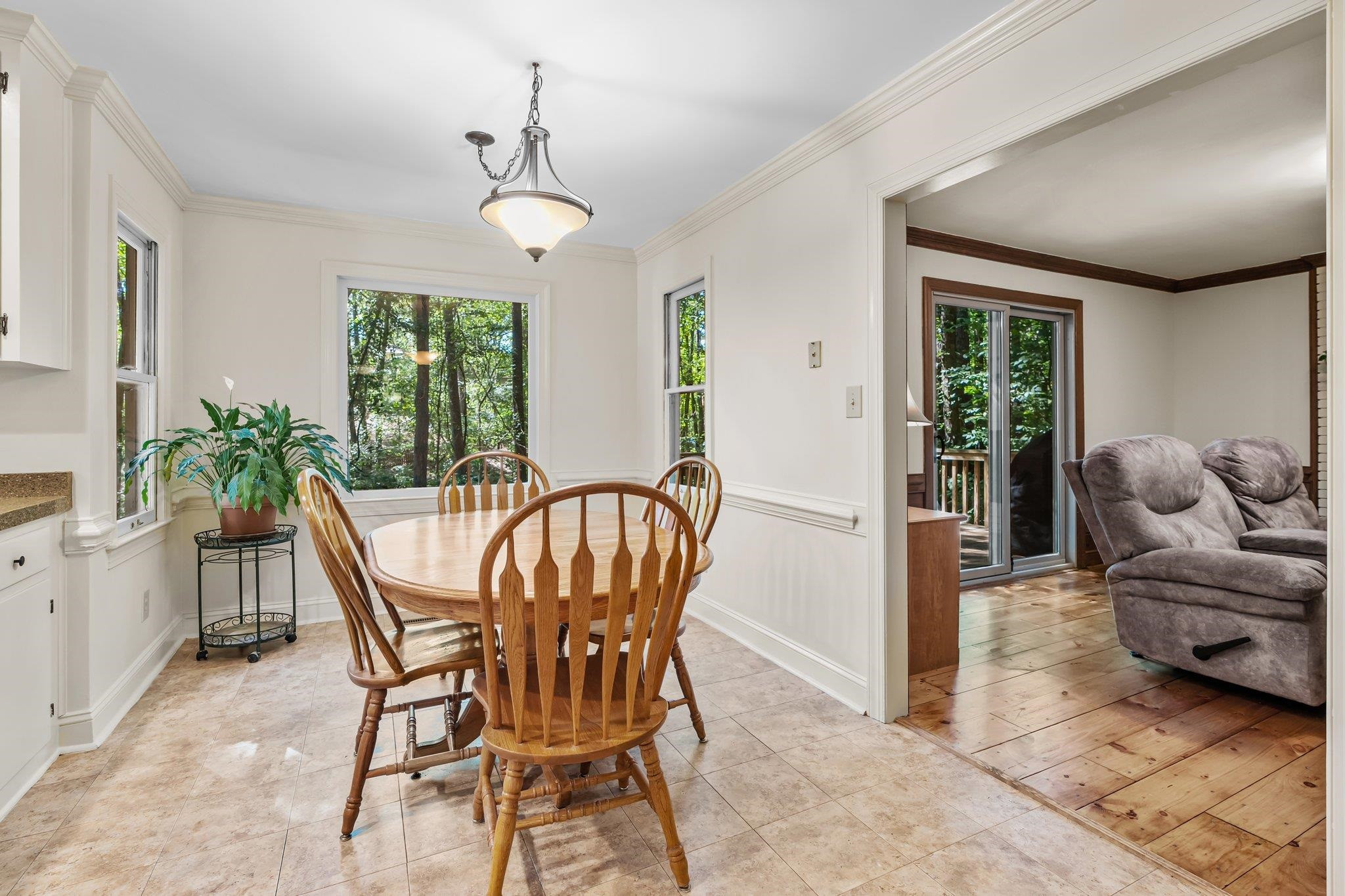 4918 Highgate Drive Durham, NC 27713 - Photo 10 of 44 a dining room with furniture and window