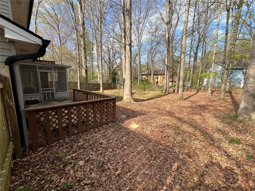 1915 Matthew Way Lithonia, GA 30058 - Photo 8 of 10 a view of a house with a yard