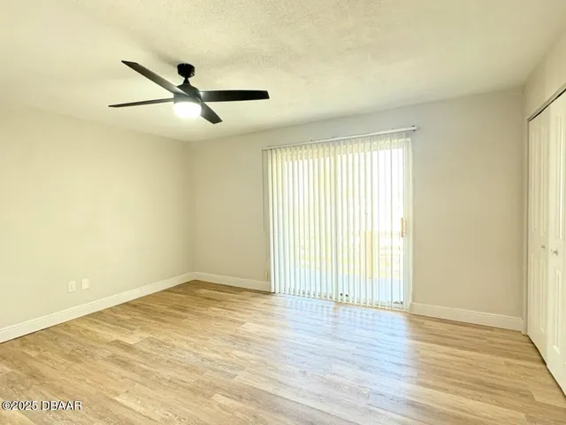 a bathroom with a sink mirror vanity and toilet