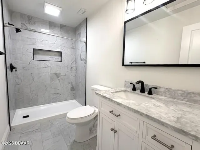 a view of a balcony with an outdoor space