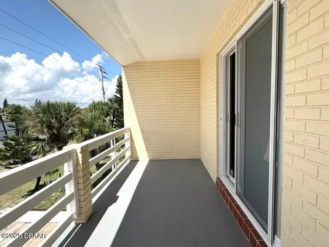 a view of a yard with an outdoor space