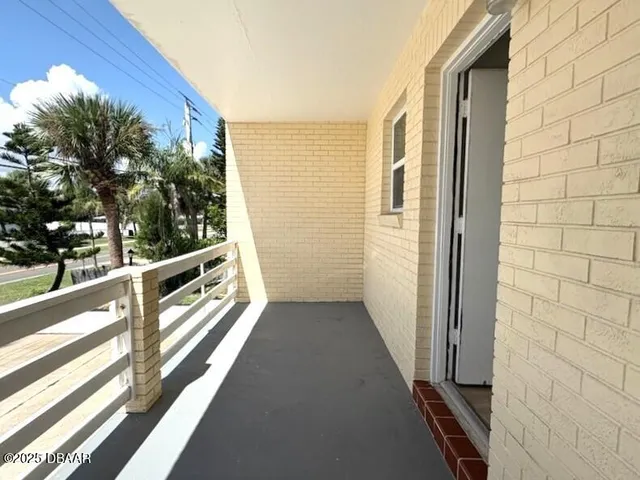 a view of a door and chair