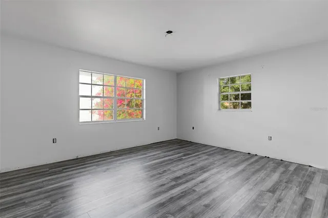 an empty room with windows